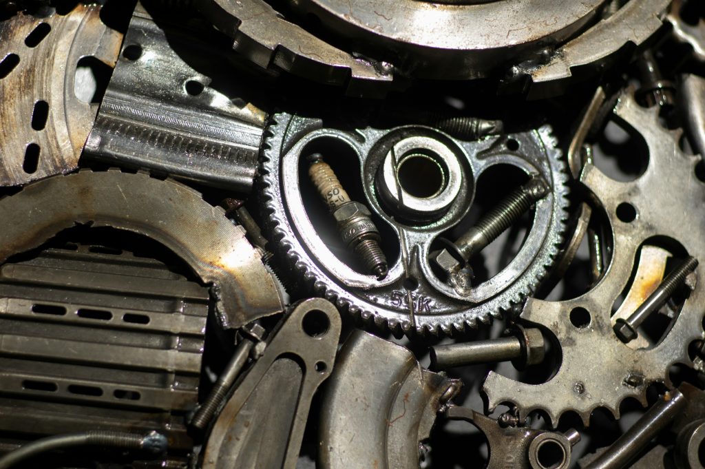 Close-up of disassembled car engine parts. Vehicle maintenance and repair services at 7 Force Garage Sheffield.